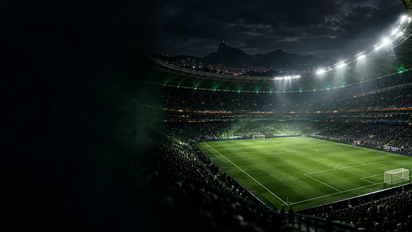 Campo de futebol iluminado em um estádio à noite